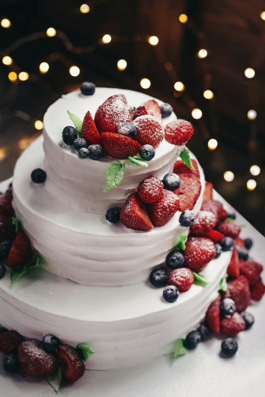 White wedding cake with berries